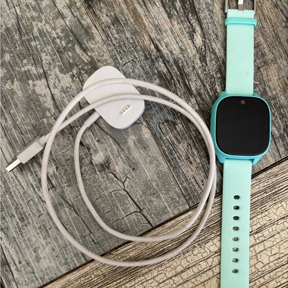Mint Green Smartwatch with Charging Cable
